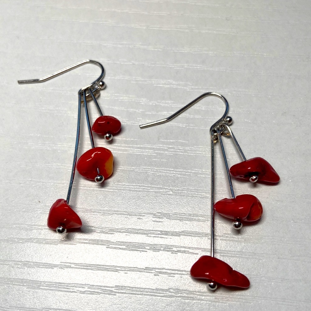 Handmade red bamboo coral earrings.